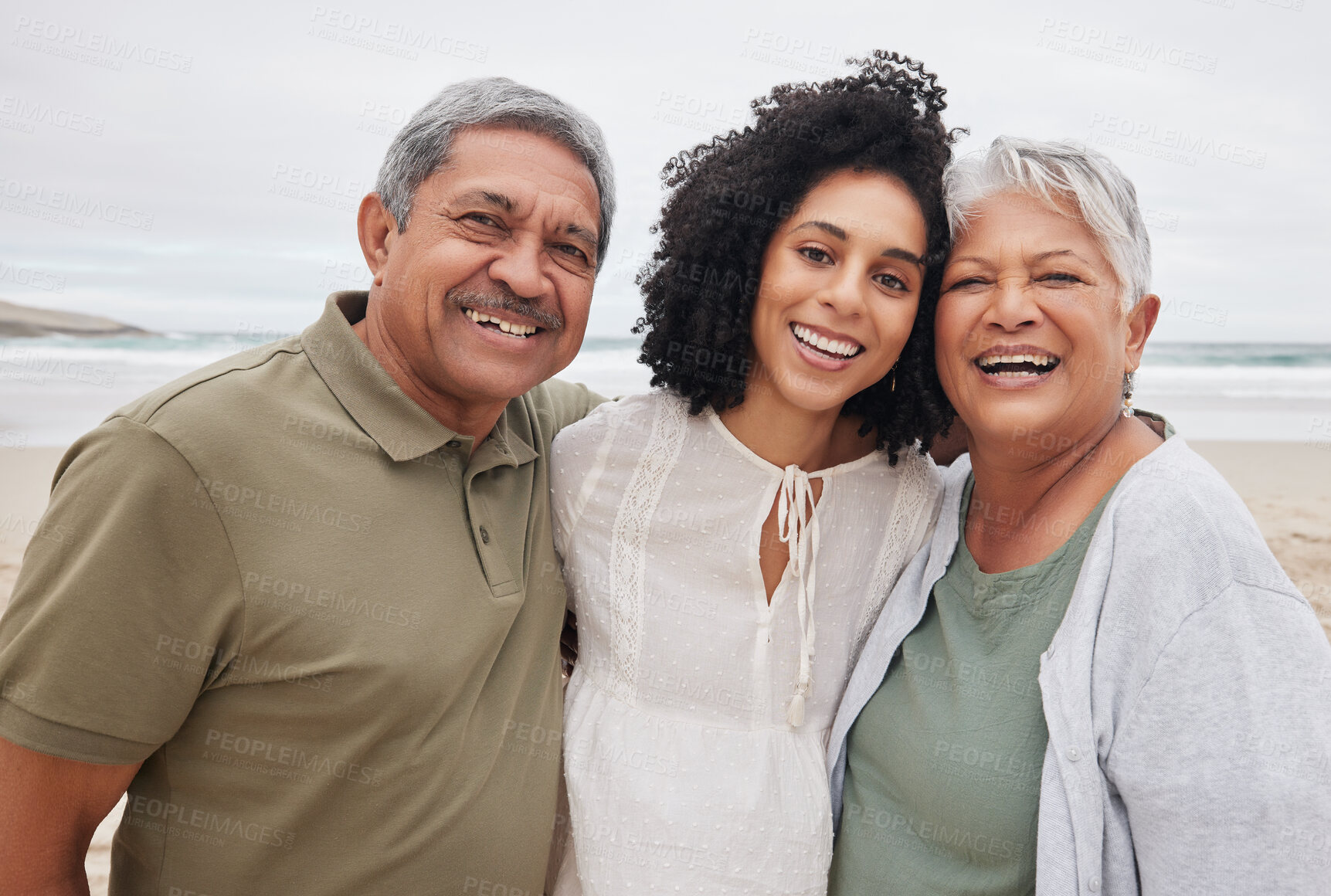 Buy stock photo Portrait, happy woman and senior parents at beach on holiday, vacation or travel outdoor. Face, adult daughter and mother and father bonding together at ocean for family connection, love and support