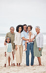 Portrait, happy and big family at beach on holiday, vacation or travel outdoor on mockup space. Parents, grandparents and kids at ocean for care, children bonding together and smile for love at sea