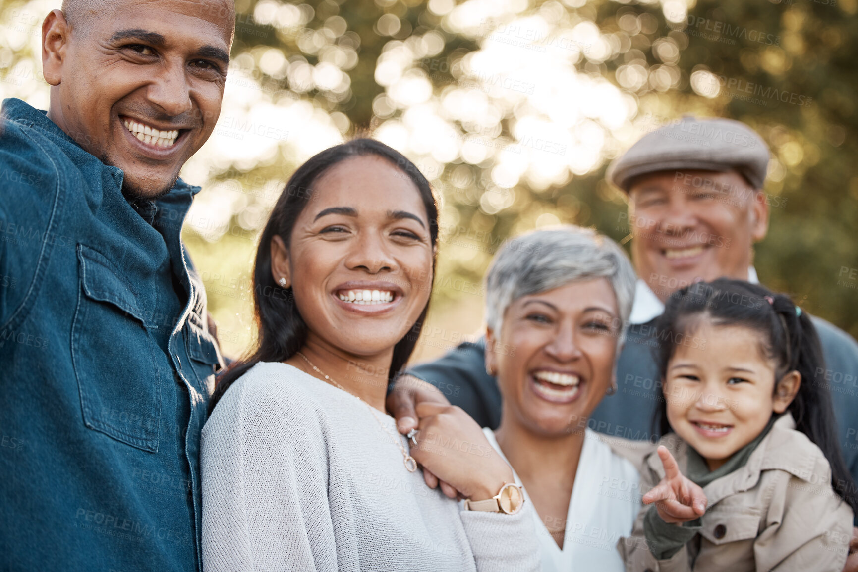 Buy stock photo Parents, child and grandparents with portrait in park for memory, smile and bonding for holiday in nature. Men, women and girl kid with hug, face and excited and vacation family in summer sunshine