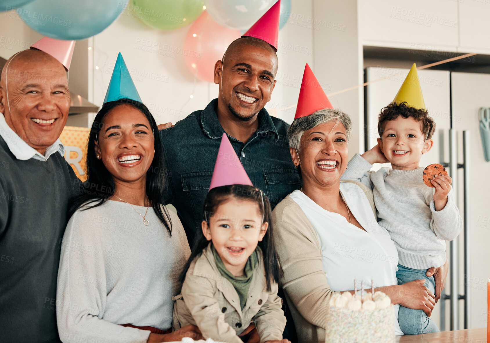 Buy stock photo Birthday, party or portrait of happy family in home for celebration, bond or growth together. Smile, hat or excited grandparents with cake or children siblings in house for fun joy or special event