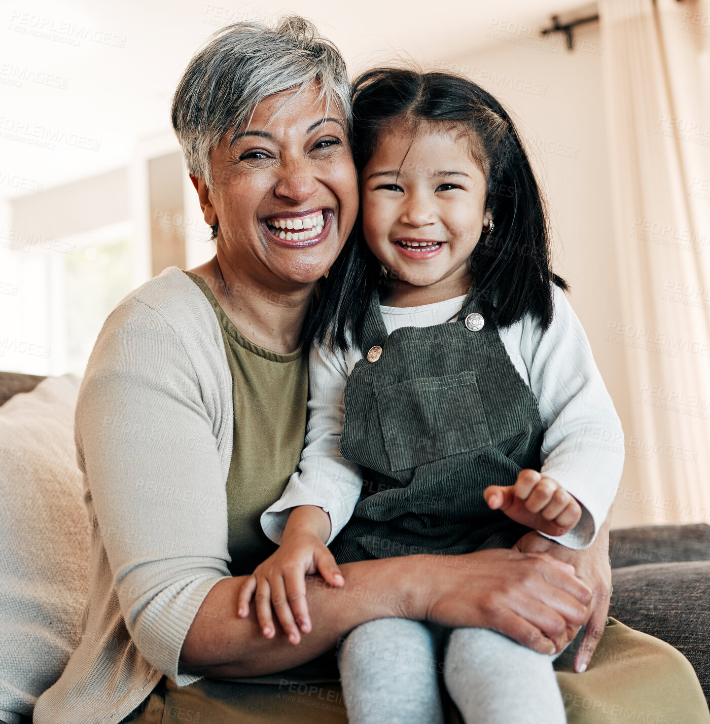 Buy stock photo Portrait, love and grandmother with child on couch together for bonding, connection and care in living room of home. Happy family, woman and girl on sofa with happiness for relaxing, weekend and face