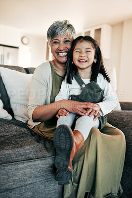 Buy stock photo Portrait, care and grandmother with child on sofa together for bonding, connection and love in living room of home. Happy family, woman and girl on couch with happiness for relaxing, weekend and face