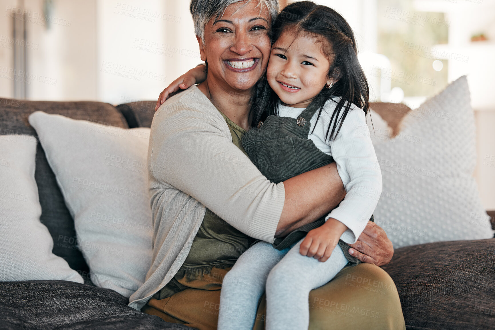 Buy stock photo Portrait, love and grandmother with girl on sofa together for bonding, connection and care in living room of home. Happy family, woman and child on couch with happiness for relaxing, weekend and face