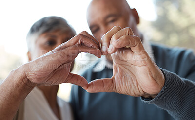 Buy stock photo Marriage, heart hands and senior couple with care, romance and romance with bonding, relationship and retirement. Face, old woman and elderly man with love symbol, kindness and health with trust