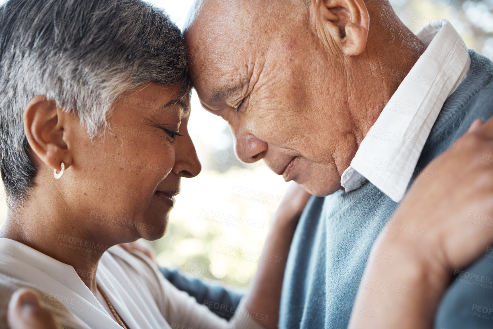 Buy stock photo Hug, forehead and senior couple with love, marriage and retirement with bonding, relationship and romantic. Face, happy old woman and elderly man embrace, trust and health with romance and care