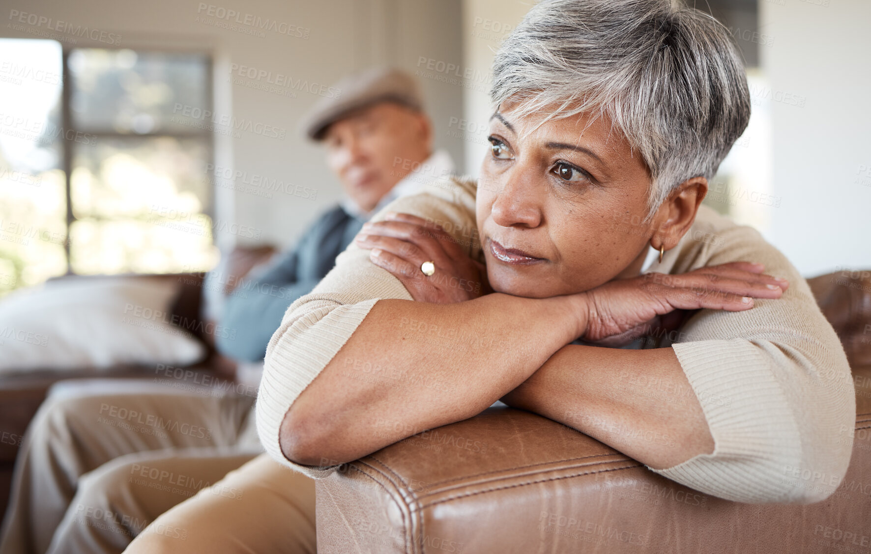 Buy stock photo Divorce, stress and senior couple on a sofa fight, argue and angry at home together. Marriage, doubt and elderly woman thinking in living room with debt, fear or anxiety while ignoring toxic partner