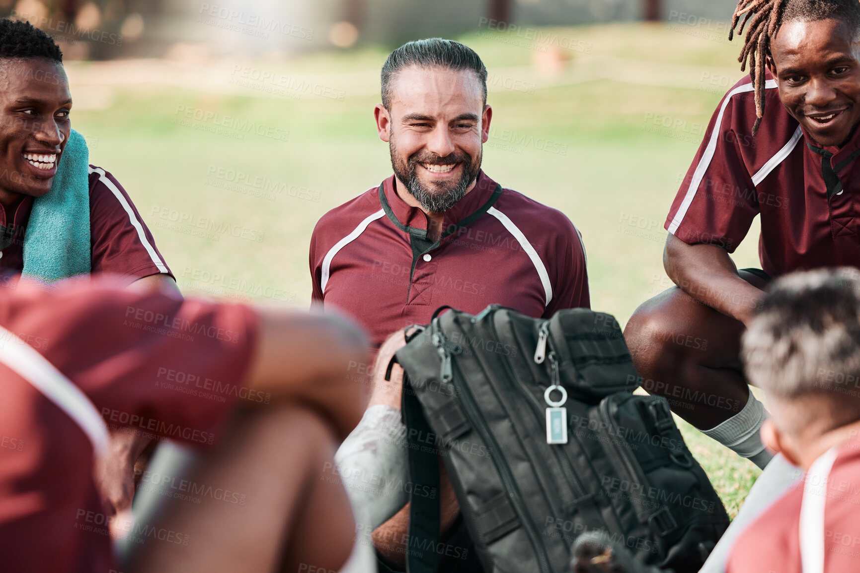 Buy stock photo Sports, group and rugby team in a circle at training for planning strategy for game or match. Fitness, huddle and athletes talking for players and motivation on an outdoor field for practice