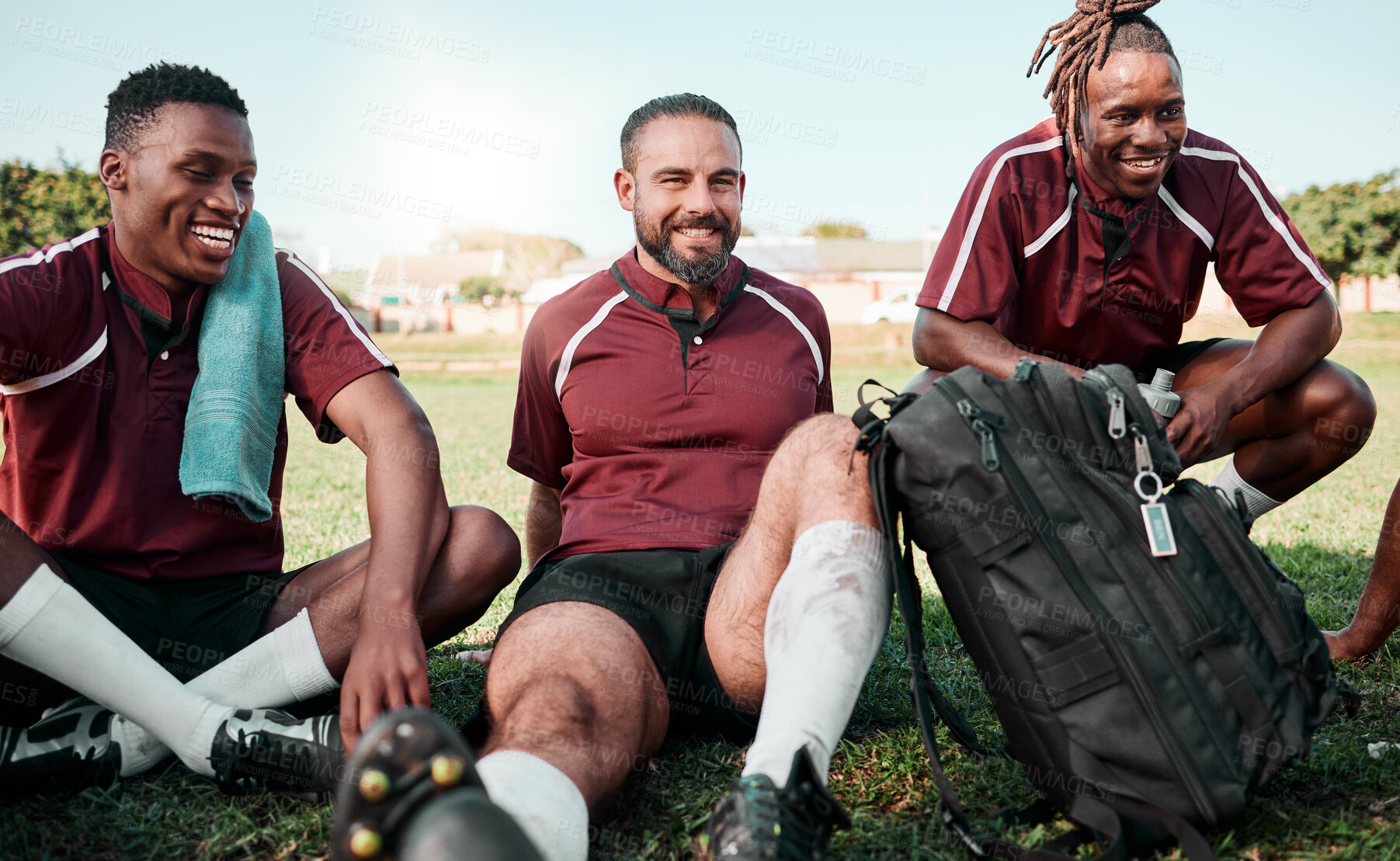 Buy stock photo Fitness, people and rugby players on a break at training for planning strategy for game or match. Sports, group and athletes talking for team building and motivation on an outdoor field for practice.