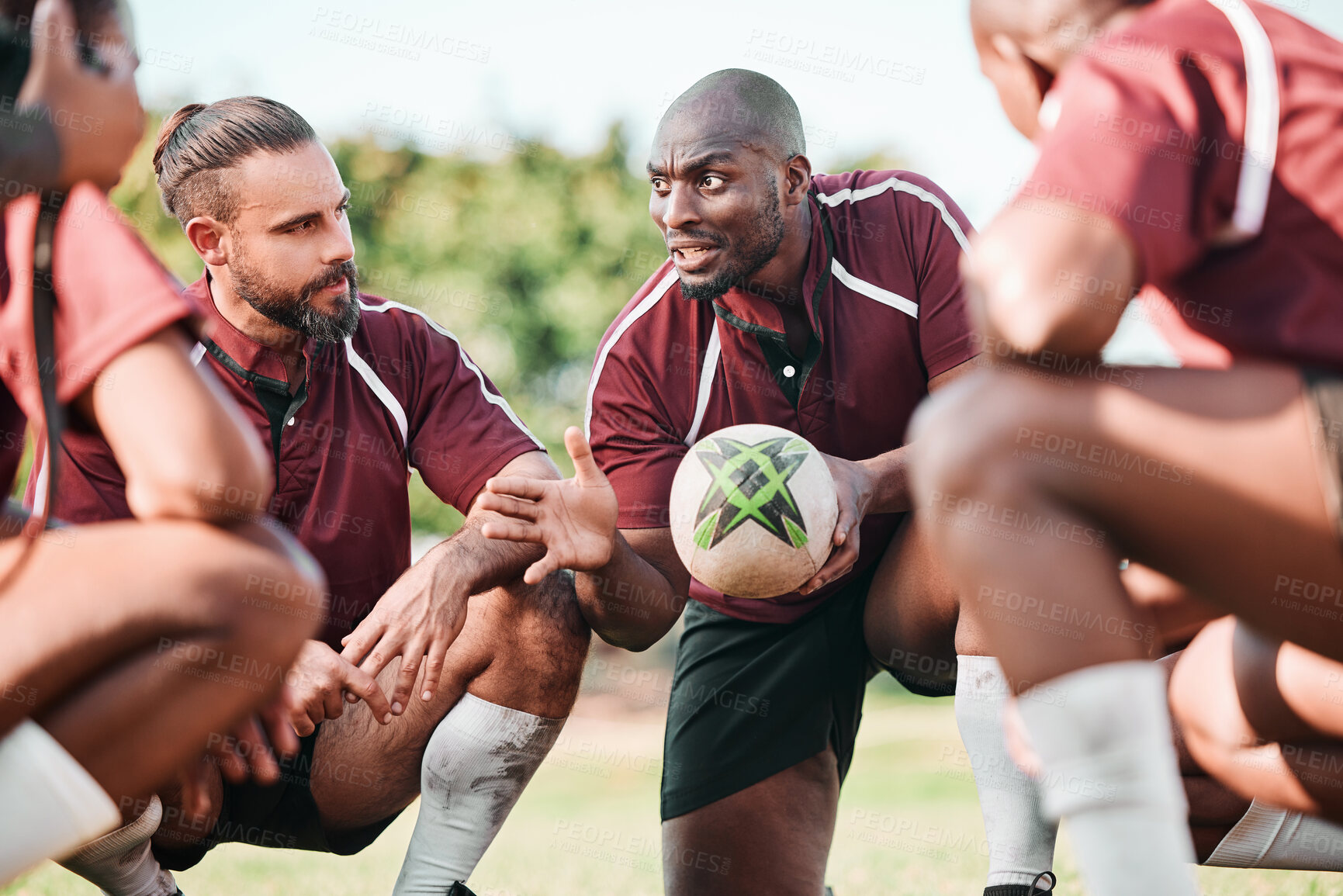 Buy stock photo Fitness, huddle and rugby team on a field planning a strategy for a game, match or tournament. Sports, diversity and captain talking to group at training, exercise or practice on an outdoor pitch.