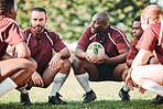 Sports, huddle and rugby team on a pitch planning a strategy for a game, match or tournament. Fitness, diversity and captain talking to group at training, exercise or practice on an outdoor field.