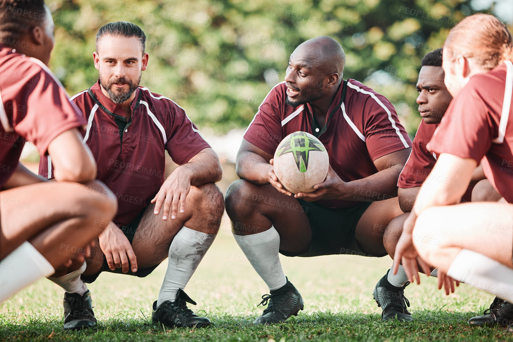 Buy stock photo Sports, huddle and rugby team on a pitch planning a strategy for a game, match or tournament. Fitness, diversity and captain talking to group at training, exercise or practice on an outdoor field.