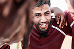 Sports, huddle and rugby team on a field planning a strategy for a game, match or tournament. Fitness, diversity and captain talking to group at training, exercise or practice on an outdoor pitch.