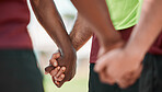 Hand, men and praying in group on field for training, workout and game motivation outdoor with closeup. Fitness, people and gratitude for exercise, performance and prayer with solidarity and unity