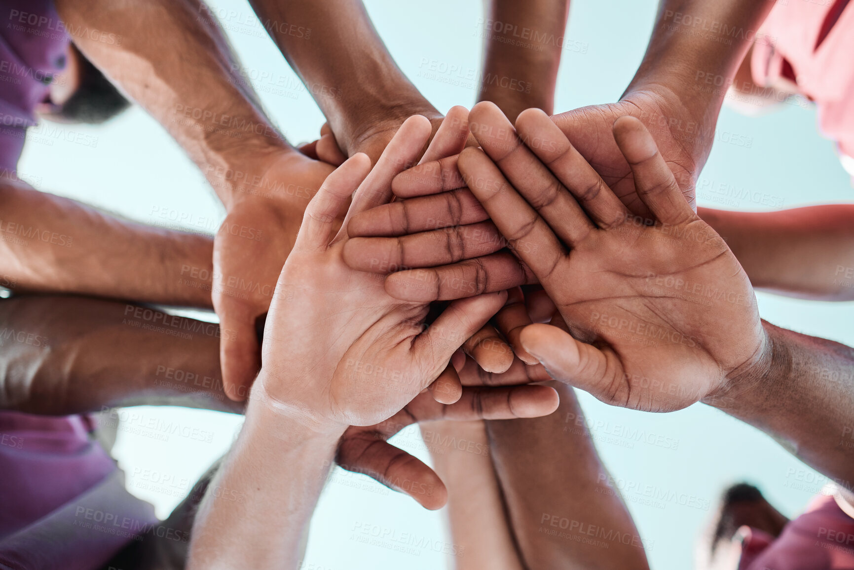 Buy stock photo People, teamwork and hands together in collaboration, goals or community for motivation below. Closeup of group piling in team building, solidarity or trust in support for sports, rugby or match