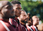 Rugby, team and serious men at field for training, workout and practice outdoor. Fitness group, sports and people exercise together, thinking and planning to start for competition, game and match