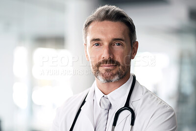 Buy stock photo Mature doctor, portrait and man in hospital for healthcare, wellness and career in clinic. Face, medical professional and confident expert surgeon, therapist worker and senior employee in Canada.