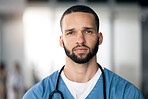 Portrait of man, surgeon or doctor in hospital with ppe, healthcare worker with confidence in medicine and help. Health expert, medical professional and serious face of nurse in clinic for surgery.