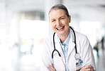 Stethoscope, senior laughing and woman doctor with healthcare, medical work and hospital job. Wellness, heart cardiology and clinic with a female professional with funny joke and happy with career