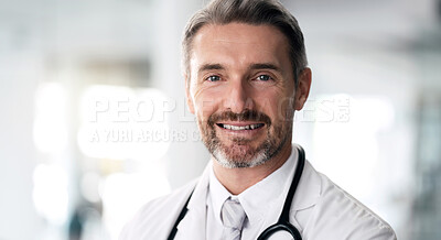 Buy stock photo Mature doctor, portrait and happy man in hospital for healthcare, wellness and career in clinic. Face, medical professional smile and confident expert surgeon, therapist worker and employee in Canada