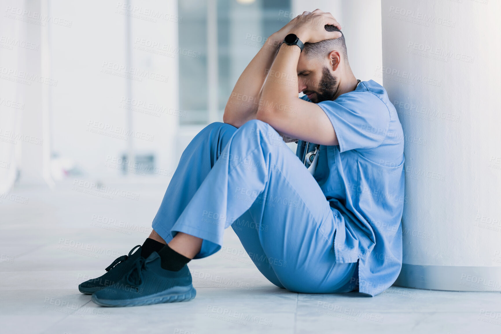 Buy stock photo Doctor, stress and sad on floor for hospital mistake, healthcare fail or bad news of clinic death. Mental health of medical worker, tired man or nurse with headache, depression and anxiety or fatigue