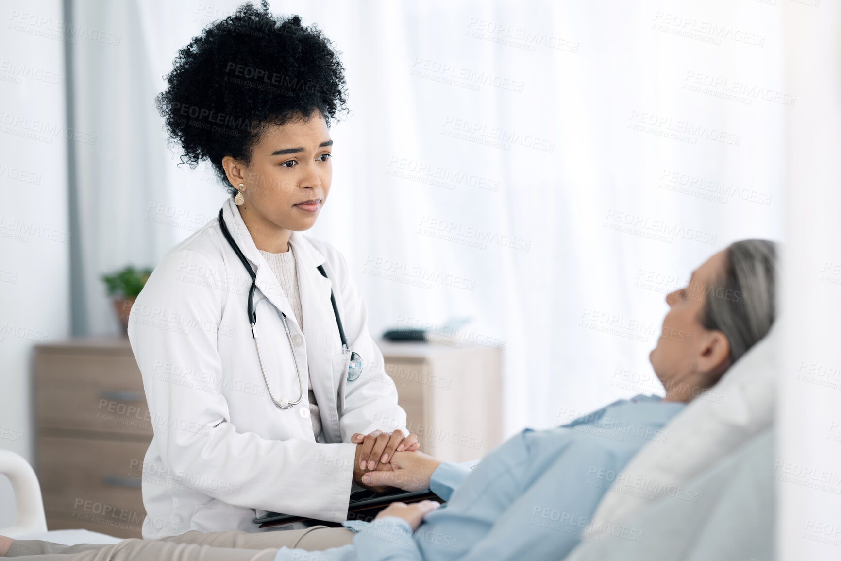 Buy stock photo Hospital, doctor and senior patient with care, comfort and empathy for diagnosis news in bed. Healthcare, clinic and health worker with woman holding hands for support, wellness and medical results