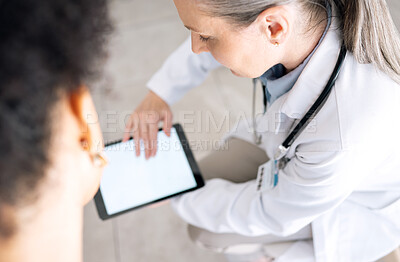 Buy stock photo Woman doctor, medical results and tablet screen at hospital with patient and mockup space. Wellness advice, technology and mature female professional with healthcare, consulting and internet search