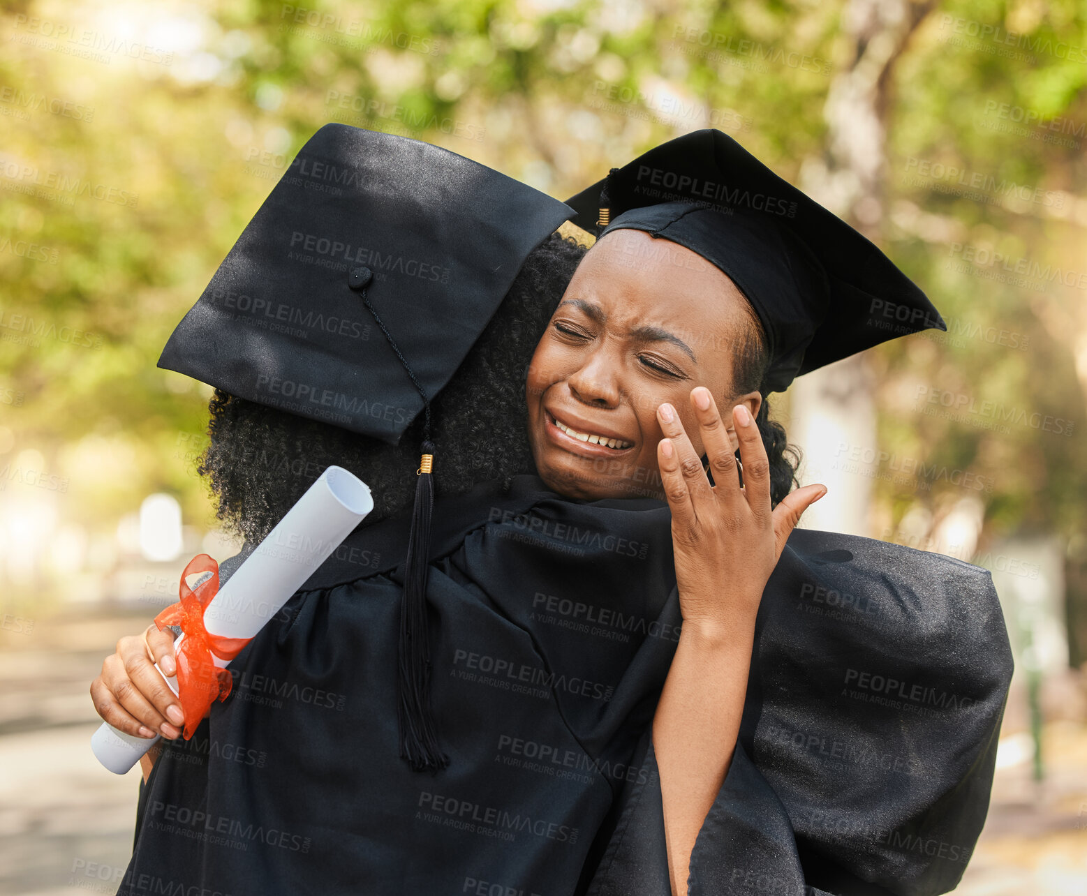 Buy stock photo Crying, graduation and women outdoor, hug and happiness with celebration, diploma and university. People, students and friends embrace, education and outside with emotion, achievement and support