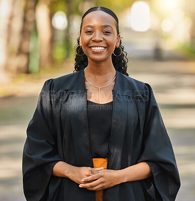 Buy stock photo Portrait, graduate and happy black woman at university at campus outdoor. Face, graduation and smile of confident African student at college for education achievement, learning and success in Nigeria