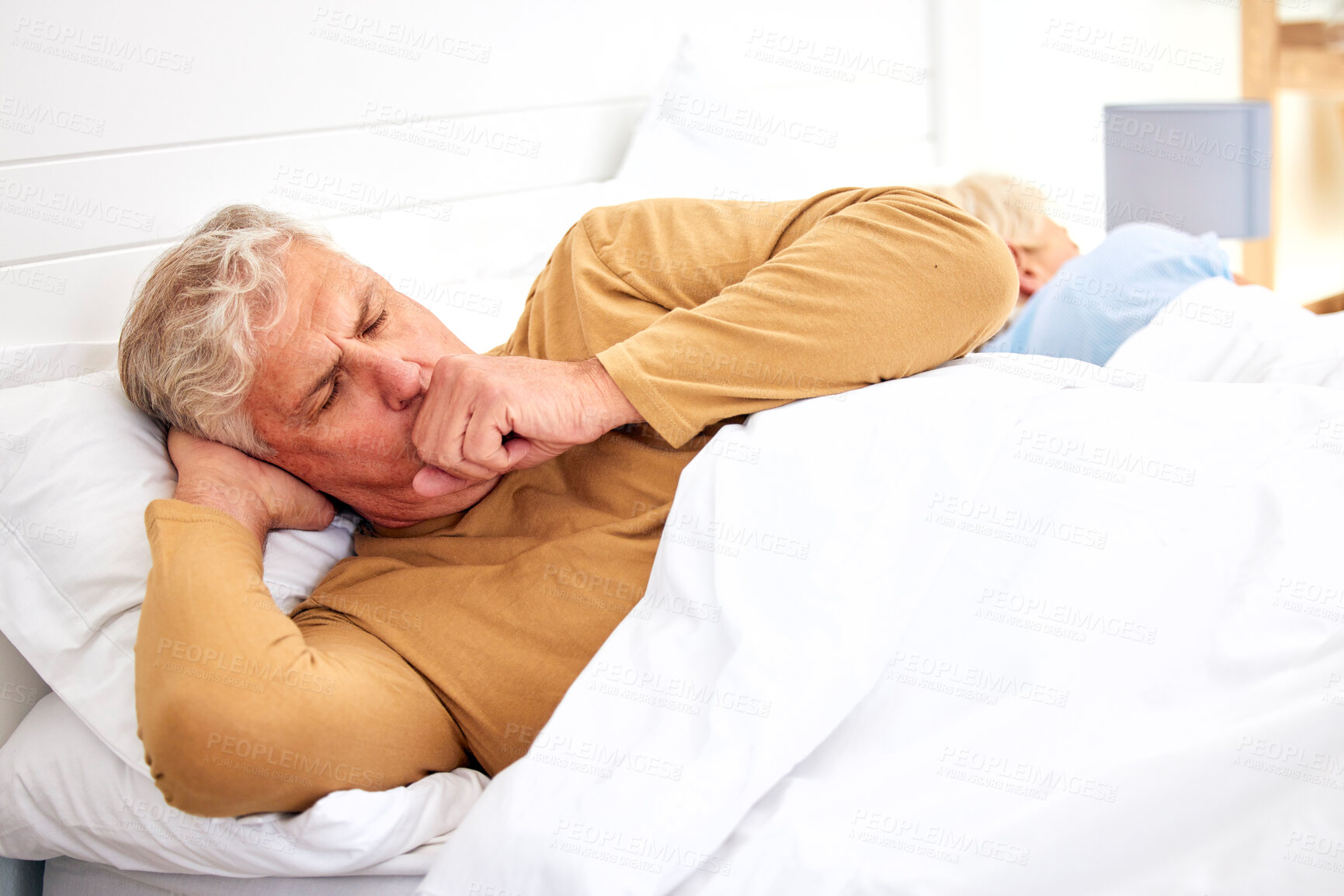 Buy stock photo Couple, coughing or sick old man in bed with wife at home with flu virus, tuberculosis or health problem. Chest pain, mature or senior person with cold fever bug, allergy or lung illness in bedroom