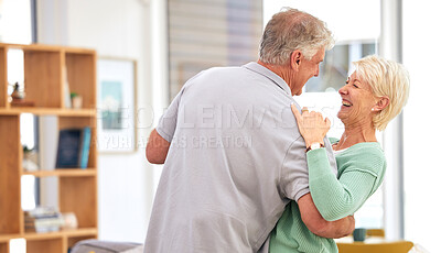 Buy stock photo Funny, dancing or happy old couple laughing with love, care or smile in marriage at home together. Hug, romantic elderly man or senior woman bonding with joy in retirement to relax in living room