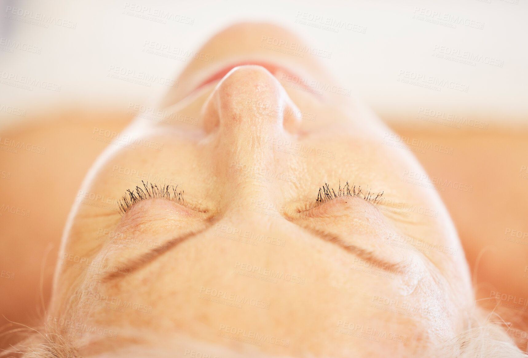 Buy stock photo Relax, sleeping and senior woman at a spa for health, wellness and anti aging skincare treatment. Calm, beauty and closeup of elderly female person with wrinkles face routine at a natural salon.