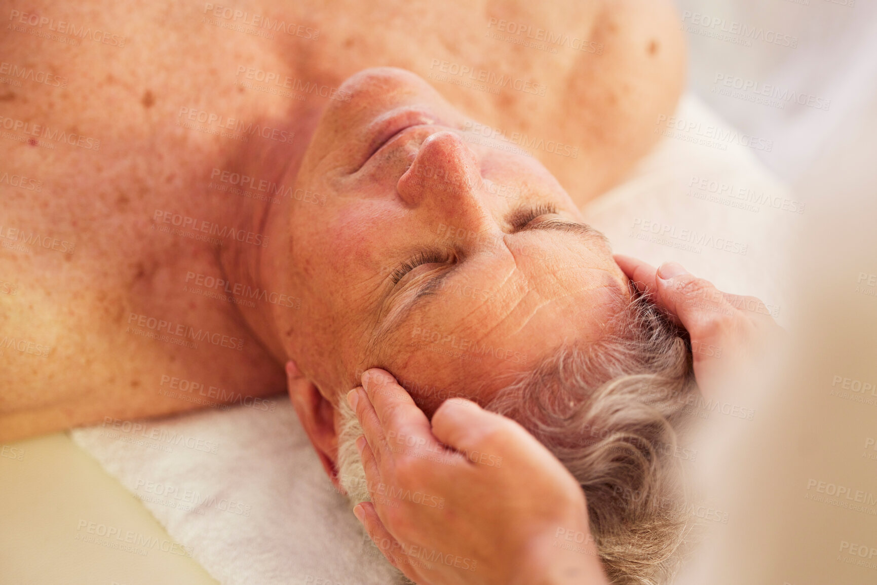 Buy stock photo Spa, head massage and senior man for luxury, self care and muscle healing treatment for relaxation. Health, wellness and elderly male person on a retirement retreat for face therapy at natural salon.