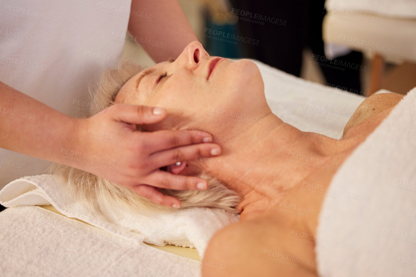 Buy stock photo Relax, face massage and senior woman at a spa for health, wellness and anti aging skincare treatment. Calm, beauty and elderly female person in retirement with wrinkles face routine at natural salon.