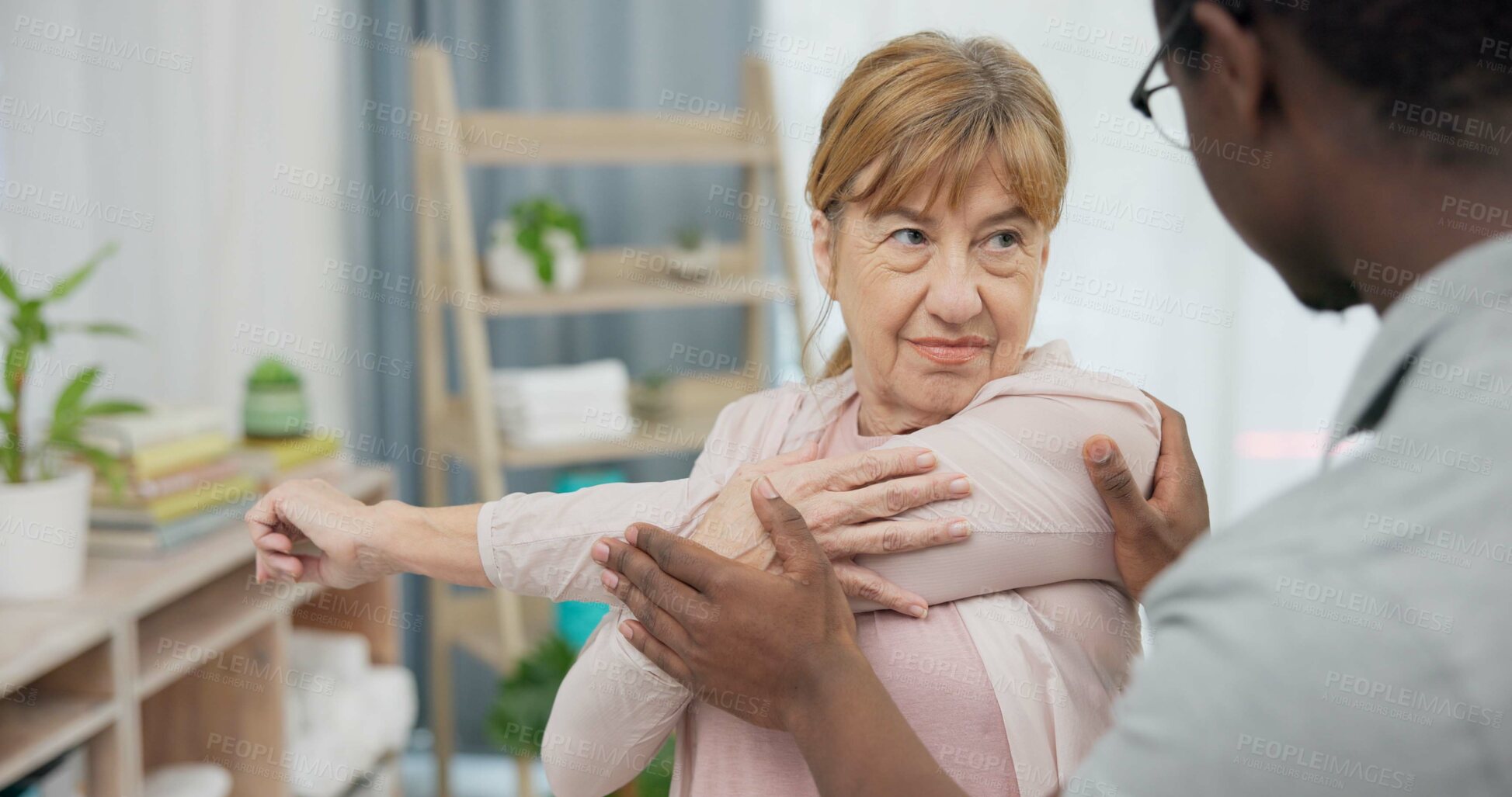 Buy stock photo Physiotherapy consultation, stretching arm and old woman for rehabilitation, recovery or advice on injury healing. Physical therapy, black man and elderly patient listening to African physiotherapist