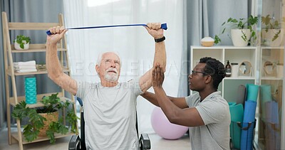 Man with disability, physiotherapist and stretching band for healthcare rehabilitation, consulting and physical therapy assessment. Clinic, physiotherapy and support for senior patient in wheelchair