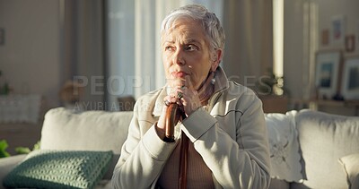 Home, thinking and old woman with depression, memory and remember with thoughts, wonder and sad. Female person, mature lady and pensioner on a couch, nursing facility and retirement with Alzheimer
