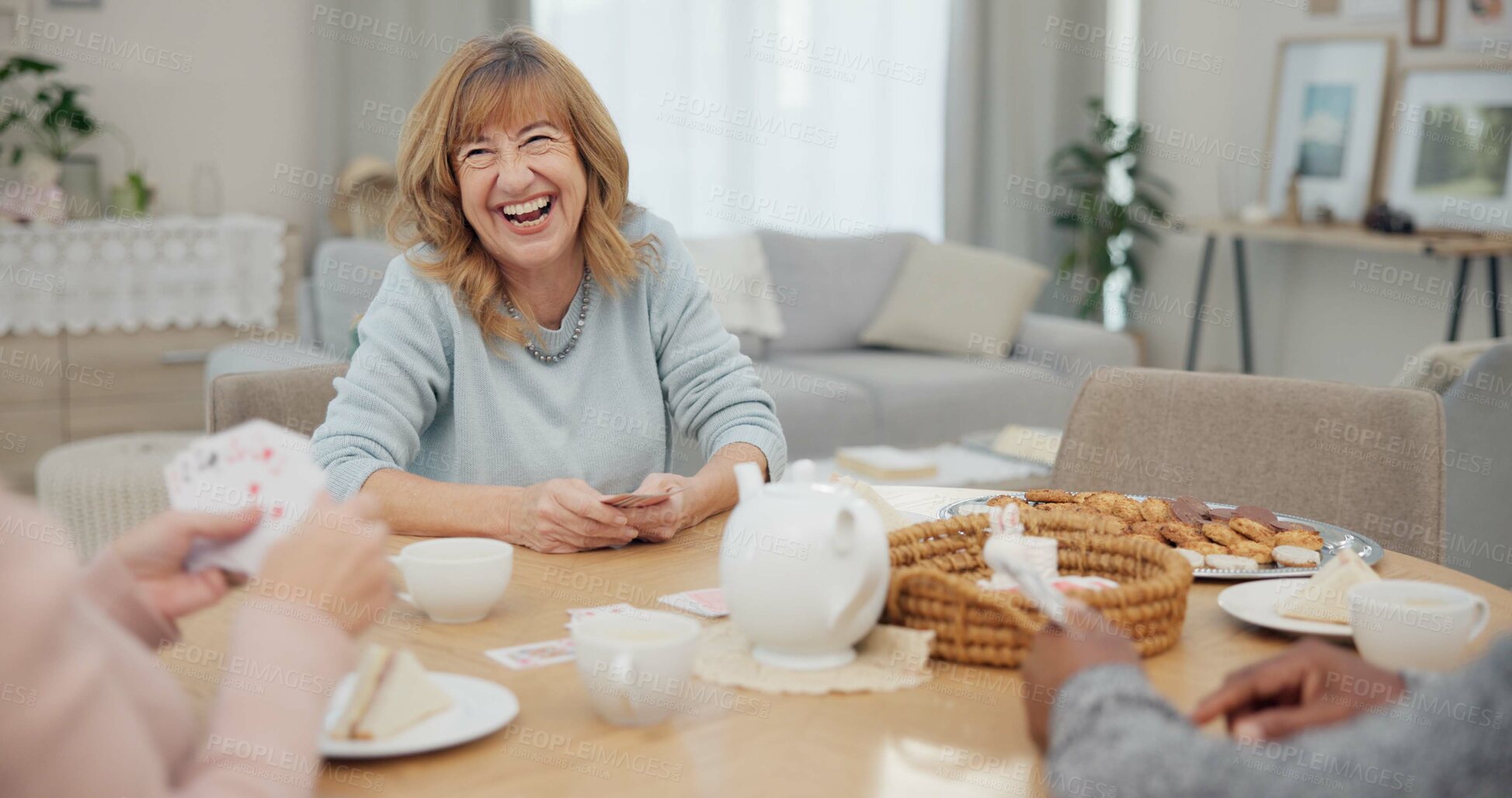 Buy stock photo Tea, happy and retirement with friends and playing cards in living room for relax, diversity and poker. Games, smile and community with group of old people in nursing home for party and celebration