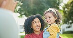 Happy family, parents or baby in park to play with love, care or quality bonding time together outdoors. Mother, face or daughter laughing at game with joy, support or smile with father or freedom