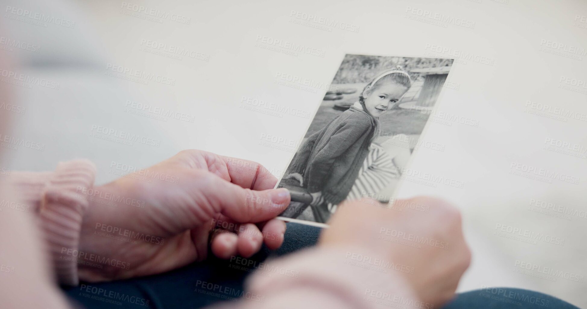 Buy stock photo Senior woman, holding and photo with memory with hands and remembering a child in closeup. Retirement, history and elderly person with retro picture in home with nostalgia or thinking about past.