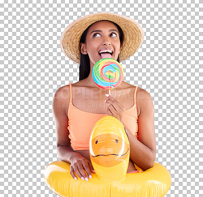Pool float, happy woman and lollipop lick in a studio with sweet and swimsuit with a smile. Isolated, blue background and holiday outfit of a young female with happiness and candy feeling fun