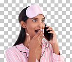Phone call, surprise and female in pyjamas in a studio with shocking, winning or good news. Communication, shock and woman model on a mobile conversation with wtf, omg or wow face by blue background.