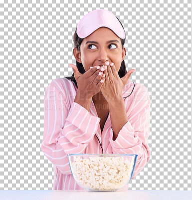 Popcorn, pajamas and thinking with a woman on a blue background in studio watching a movie for entertainment. Idea, video and night with an attractive young female eating a snack while streaming