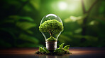 Green eco friendly lightbulb, sustainable energy and environment concept