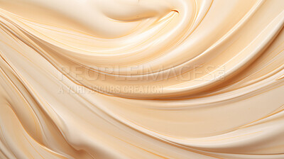 Beige smooth paint texture close-up. Swirl abstract background.