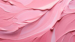 Pink smooth paint texture close-up. Swirl abstract background.