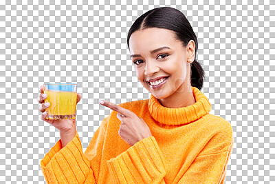 Happy woman, portrait and pointing to orange juice in studio, blue background and backdrop. Female model, drinking glass and fruit cocktail beverage for nutrition, diet and detox health of vitamin c