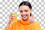 Happy woman, portrait and thumbs up for orange juice in studio, blue background and yes emoji. Female model, drinking glass and good review of fruit cocktail for nutrition, vitamin c diet and detox