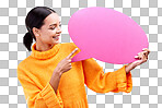 Speech bubble, smile and woman pointing to banner in studio for advertising on blue background. Happy, finger and female with poster, mockup and space for social media, announcement or billboard news