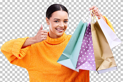 Happy woman, shopping bags and thumbs up for purchase, sale or discount against a blue studio background. Portrait of female shopper holding gift bag showing thumb emoji, yes sign or like for items
