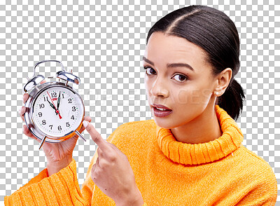 Woman, annoyed and pointing at alarm clock in portrait for warning by blue background in studio. Gen z girl, student or model with watch, time management and schedule with angry face to start morning